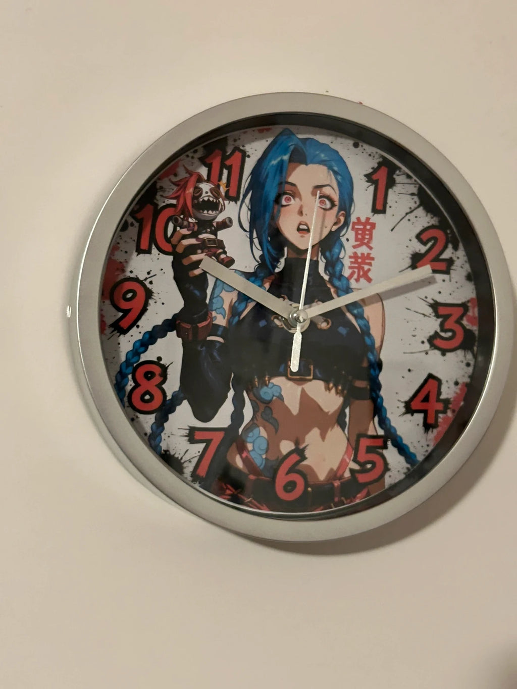 Horloge ronde murale signature Jinx