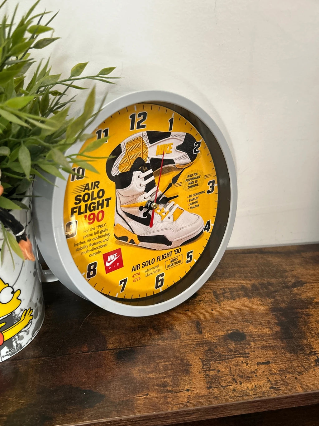 Horloge ronde murale signature Solo Air Flight 90'