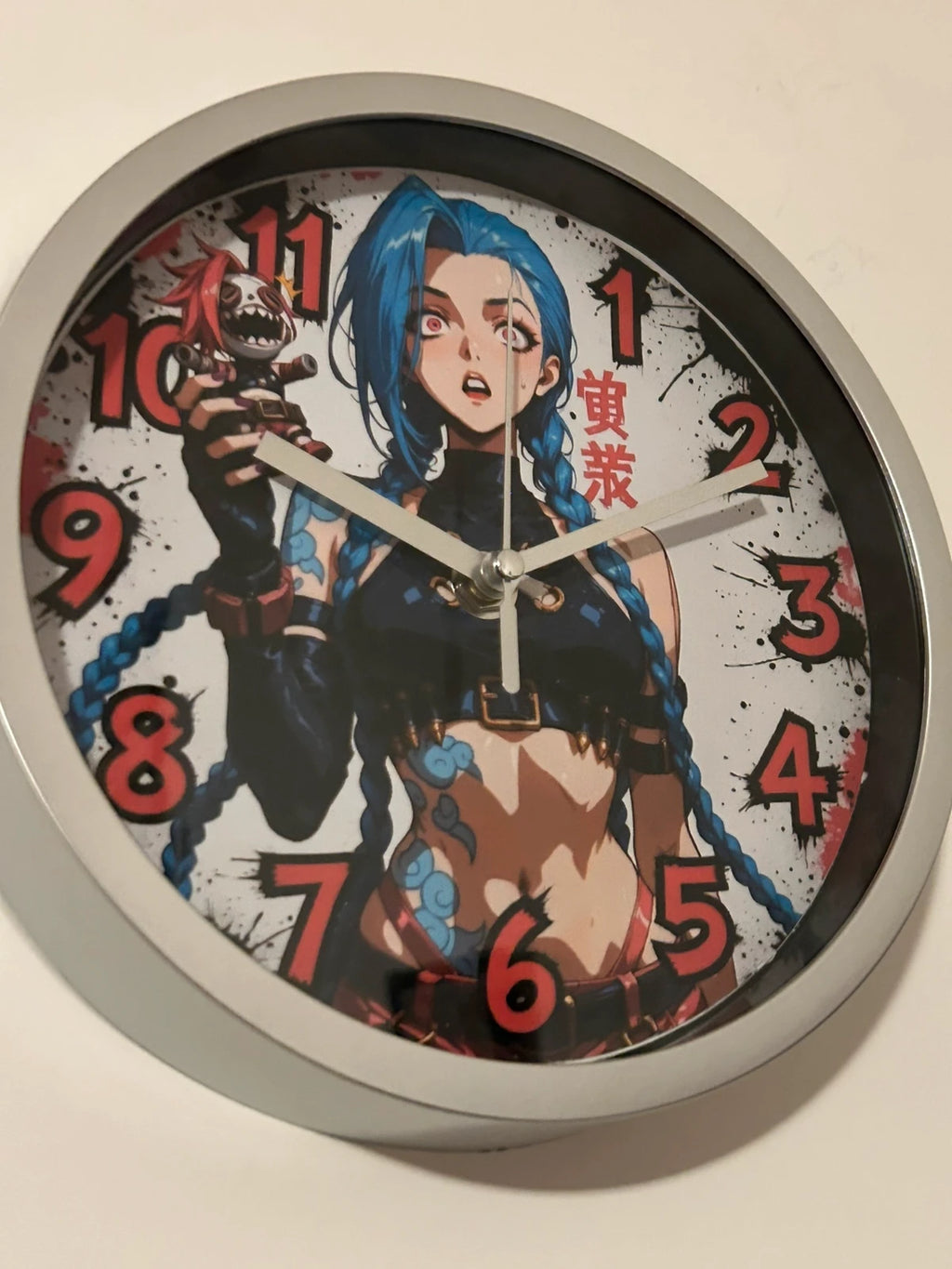 Horloge ronde murale signature Jinx