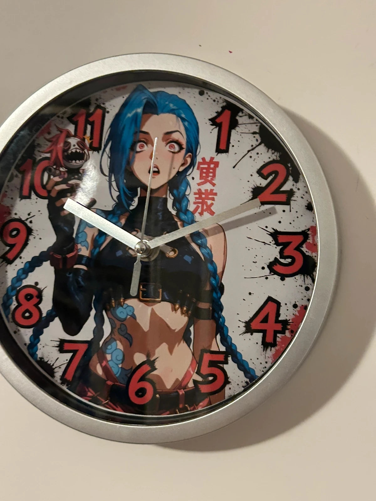 Horloge ronde murale signature Jinx