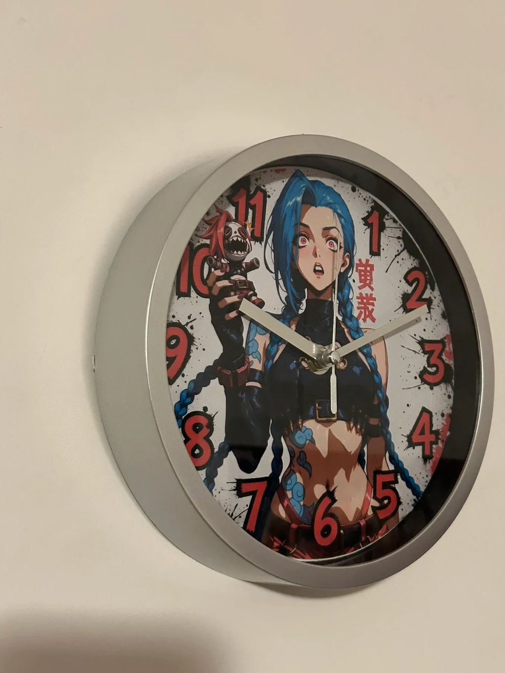 Horloge ronde murale signature Jinx