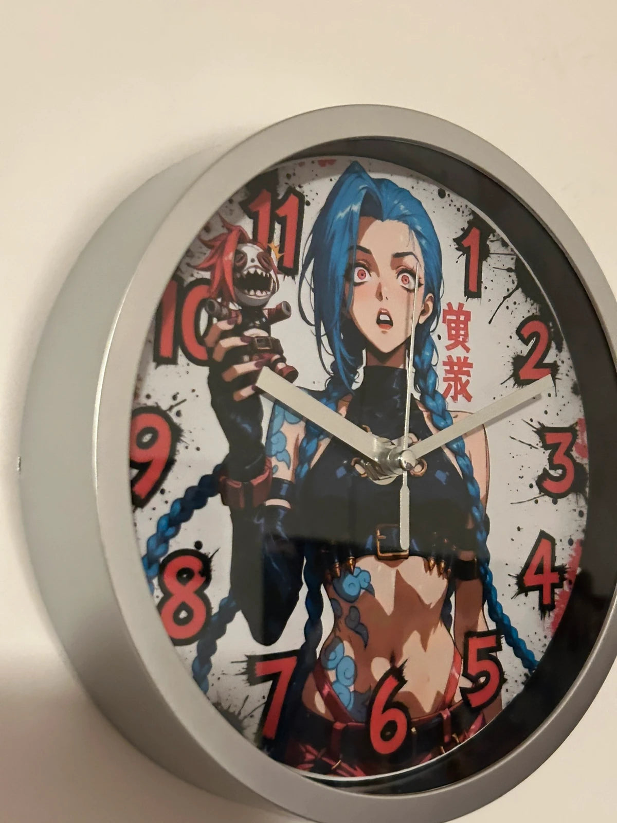 Horloge ronde murale signature Jinx