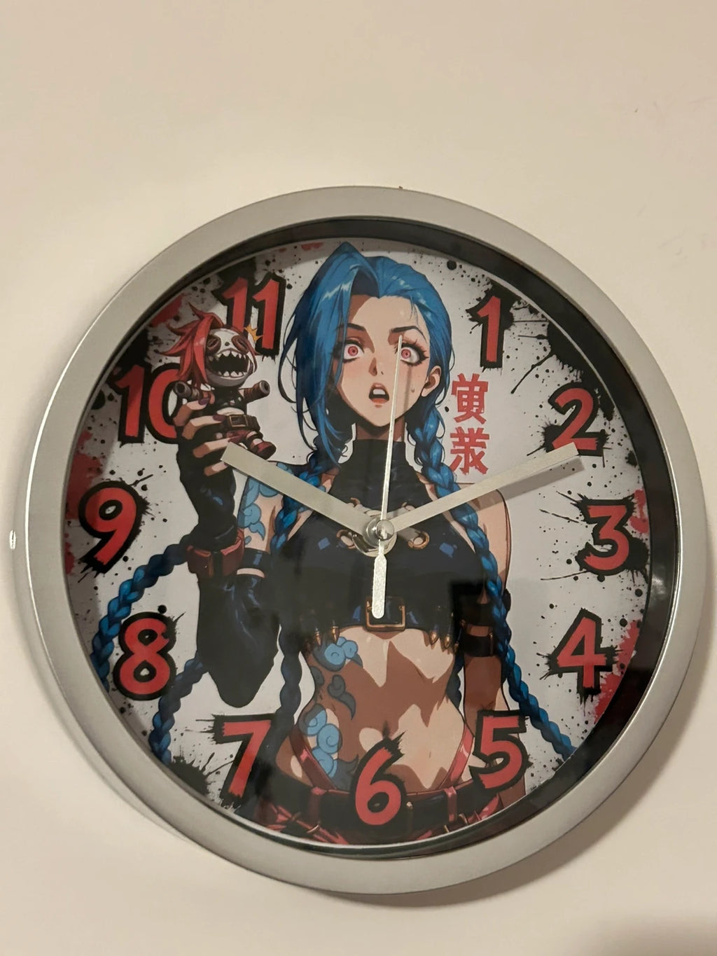 Horloge ronde murale signature Jinx